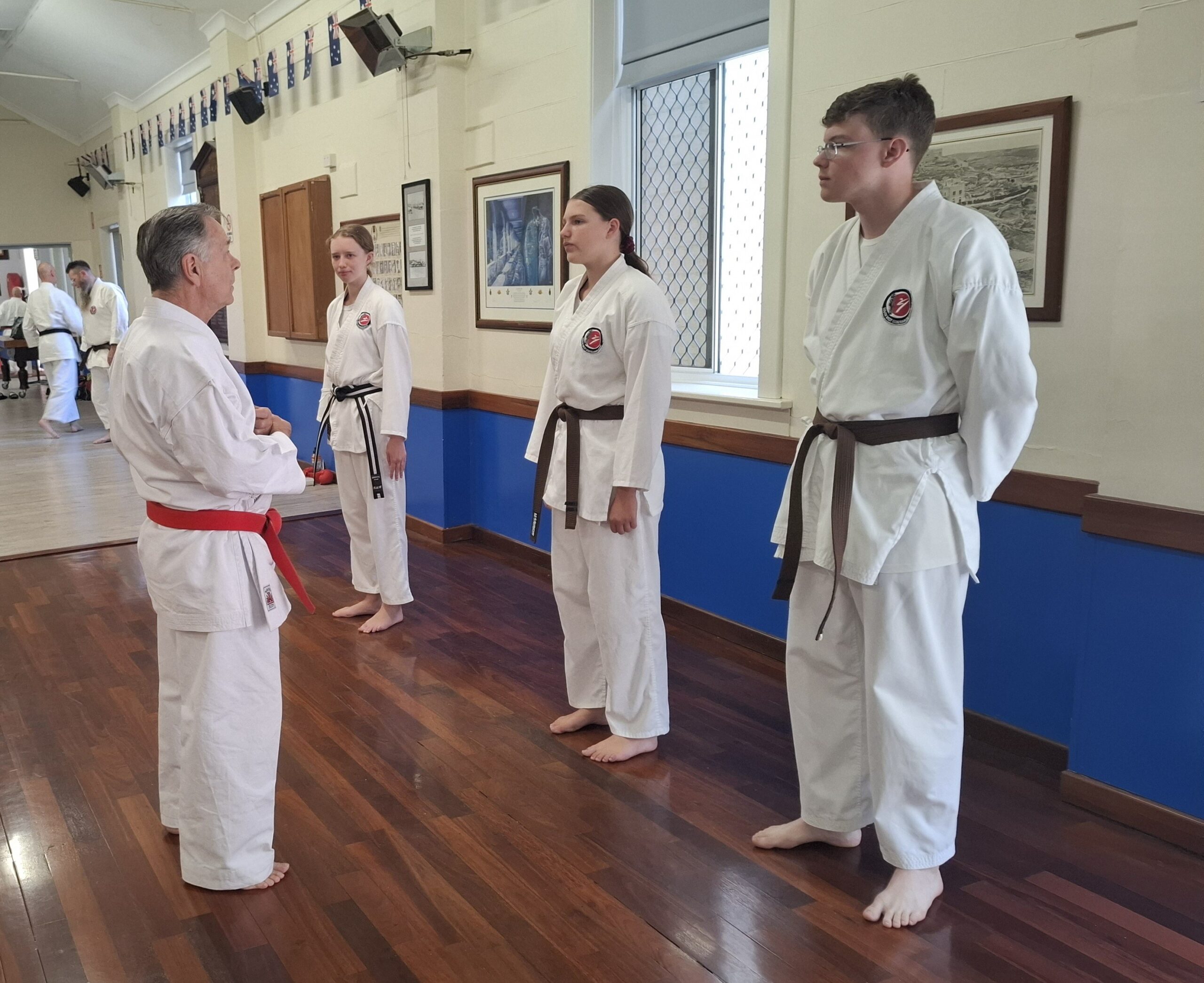 Teenagers about to grade with Alan Hanshi 2024